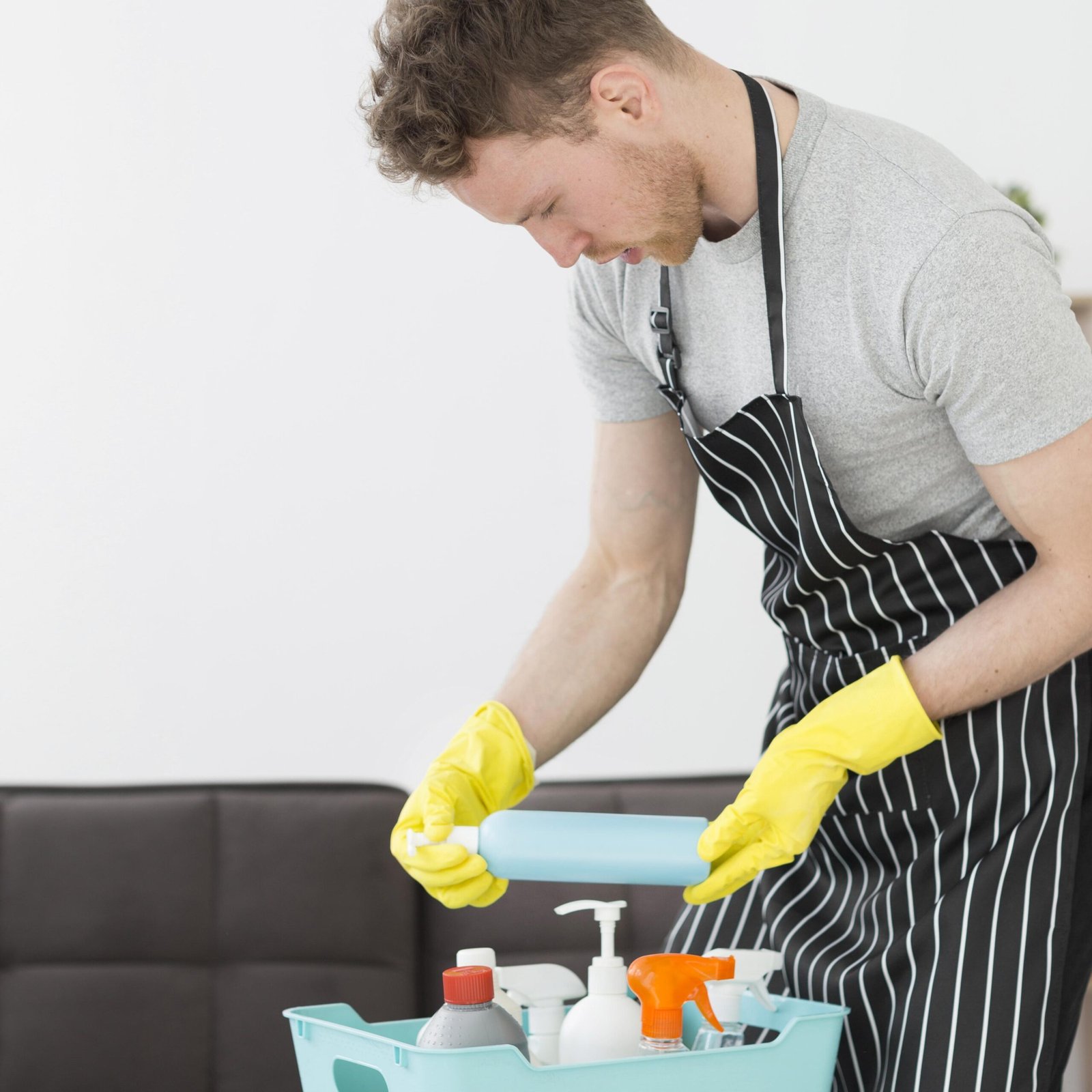high angle man with basket detergents